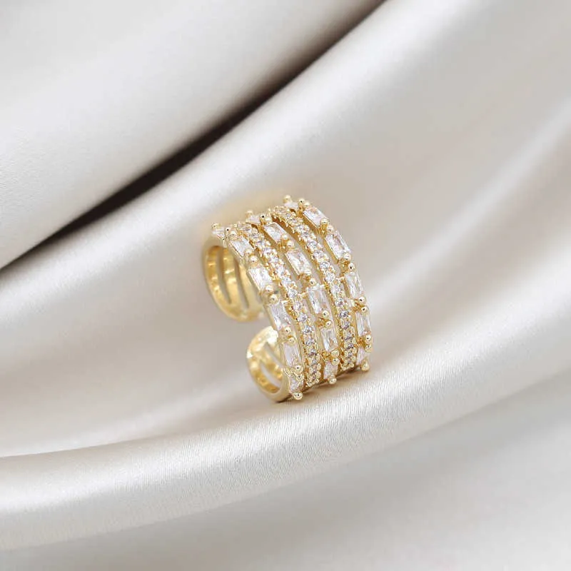 Anelli a fascia Placcatura in oro reale 14 carati Corea Nuovo design Gioielli di moda Squisito anello aperto multistrato con zirconi AAA Anello elegante da ballo per donna Z0327