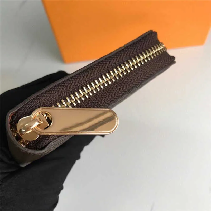 Plånböcker Klassiska herrplånbok Läder Praktisk Zippy Leisure Men's Multi- Slot Surround Zipper Men's Wallet med Box G230327
