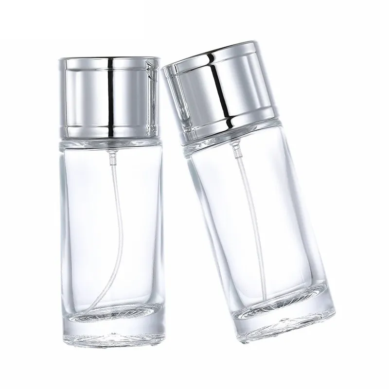 Klar rund form glas parfym flaska 20 ml 30 ml 50 ml bärbar förpackning silver spändpump med silverskydd på återfyllningsbar förpackningsbehållare