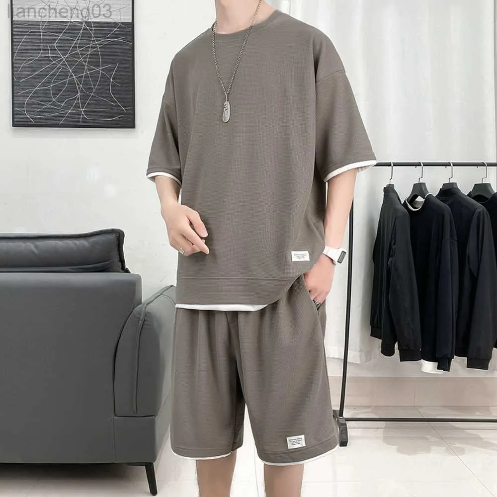 Herrespår våffla mönster 2 stycke män shorts set sommar spårdräkt män modekläder harajuku stil japan mode löst fit tröja w0328