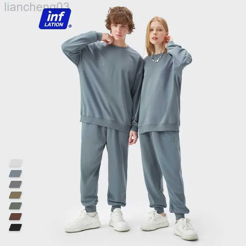 Les survêtements masculins couple couple assortiment de survêtement assorti de combinaison de jogging gris masculin 2022 Pantalon de sweat-shirt surdimensionné en blanc printemps w0328