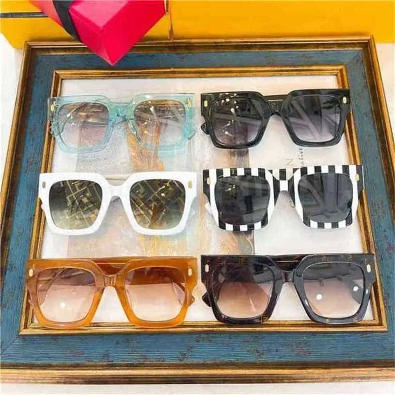 Top lüks tasarımcı güneş gözlüğü% 20 indirim moda versiyonu sıcak aile kişiliği büyük kutu plakası