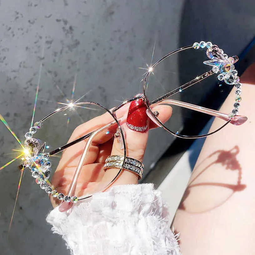 Top lunettes de soleil de créateurs de luxe 20% de réduction sur le rayonnement anti-bleu de diamant d'eau pour les femmes anti-fatigue amincissant les lunettes de lumière faciale Han Banchao