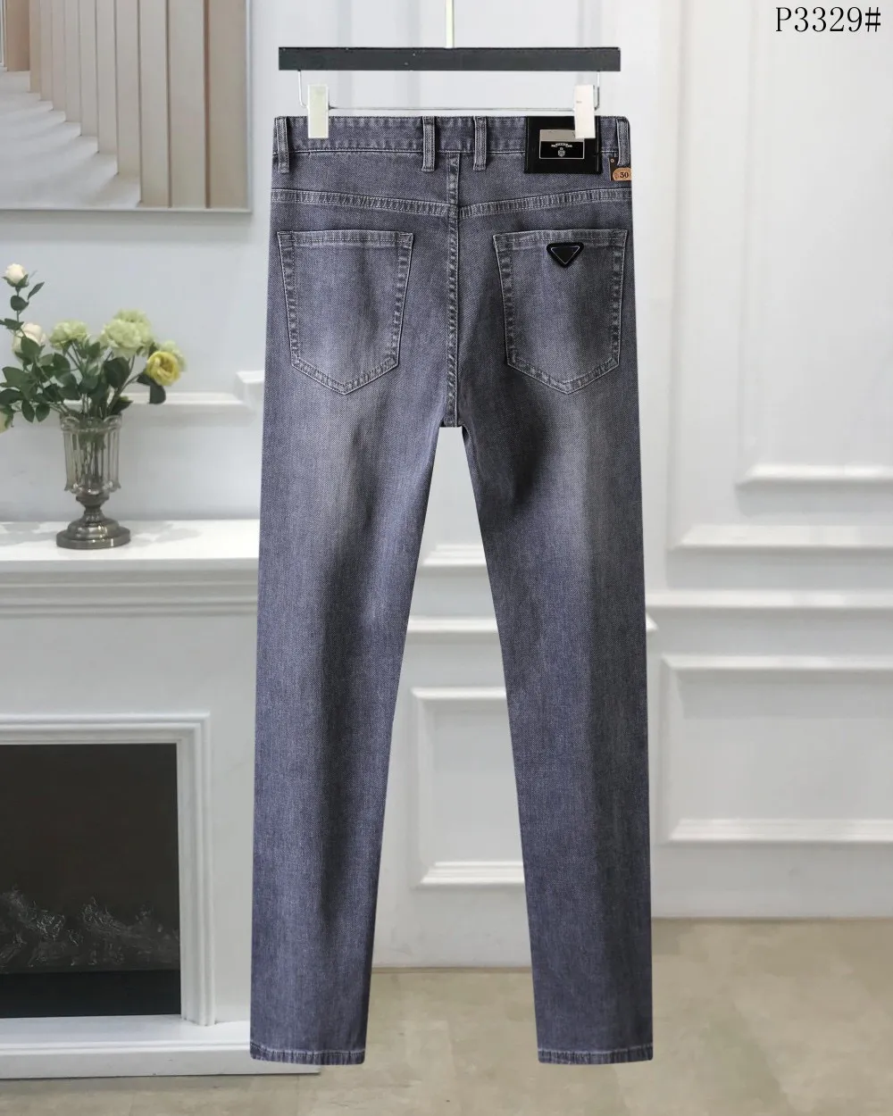 2023 dernière liste jeans skinny hommes Triangle étiquette lettres motif étiquette imprimé floral pantalon en jean hommes mode Designer Hip Hop taille 29-40