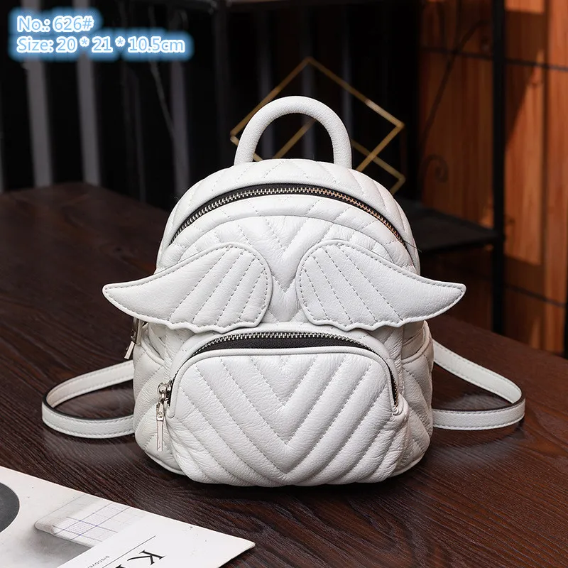 Factory wholesale ladies shoulder bags 2 colors niche design classic sewing striped handbag elegant Joker solid color leather bucket bag cute mini wing backpack