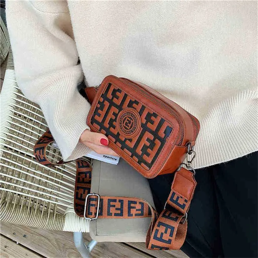 2023 Designer bag Handbag women's bags of Small female zipper camera letter wide strap Single MessengerOXKS