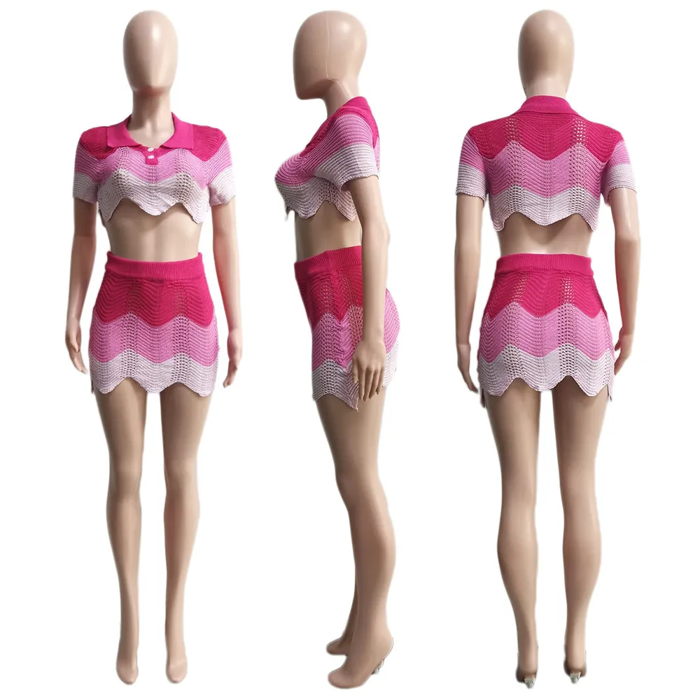 デザイナーニットドレスセット夏の女性トランダウンカラークロップトップとミニスカート2ピースセットファッション編みのスカートスーツバルク服9626