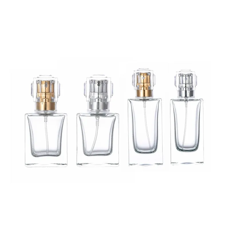 Bouteille en verre de parfum carré clair 30 ml 50 ml emballage or argent pompe de presse spary avec couvercle conteneur portable emballage rechargeable cosmétique