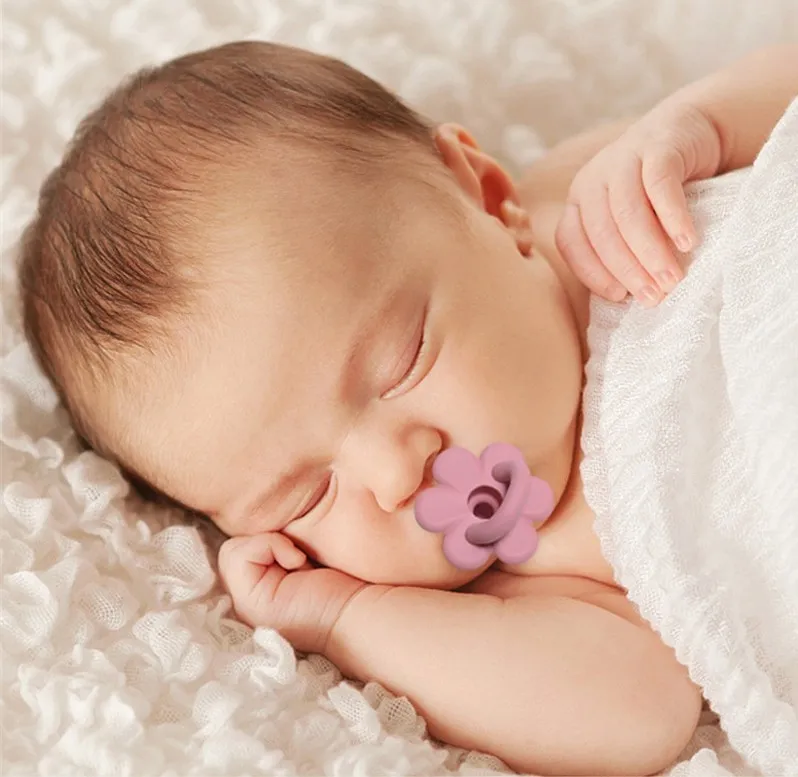 かわいい赤ちゃんシリコンのおしゃぶりの幼児幼児の花の形の噛む供給新生児のアッピーズ乳首ダミー・スーザー看護師