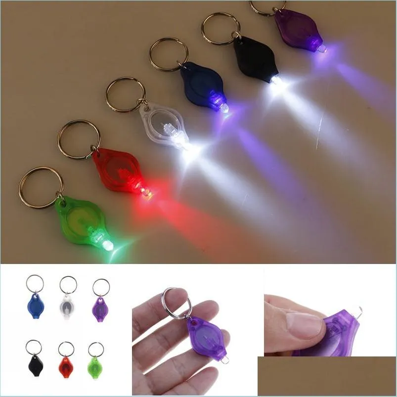 Andere Haushalts-Verschiedenes Mini-LED-Taschenlampe Schlüsselanhänger Tragbare Outdoor-Taschenlampe Schlüsselanhänger Notfall-Cam-Lampe Rucksack Light Drop Delive Dhkqw