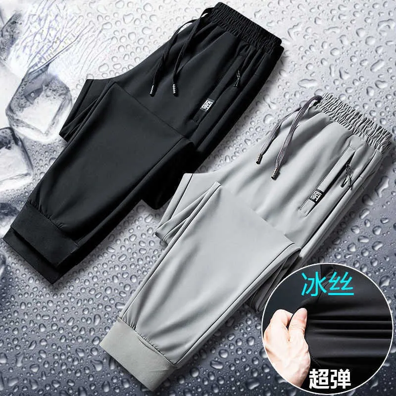 Mäns byxor Ice Silk Sports Long Pants Men's Loose All-Match Trend Ultra-Thin Elastic Drape Leggings Casual Pants W0325