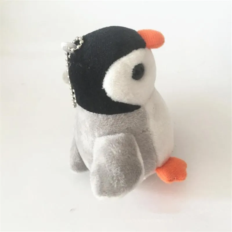 Nyckelringar 10 cm söta flickor plysch penguin doll nyckelkedja kvinnor pompon djur nyckelring kvinnliga väskor bil prydnad smycken ogräs fest gåva