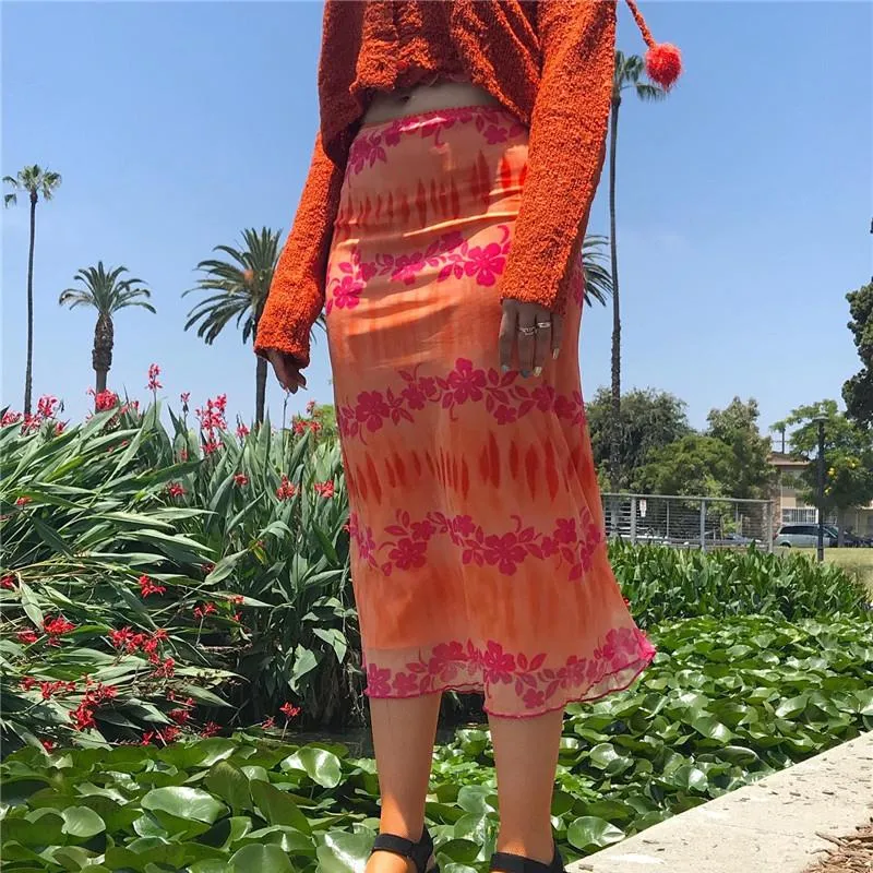 Jupes été femmes mode Boho plage jupe florale femme Style décontracté Orange fête de vacances Streetwear taille haute Midi