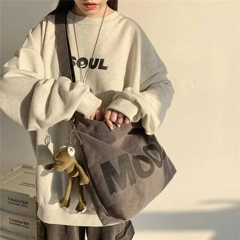 shopping bags Women's Large Capacity Hand Bill of Lading Shoulder Tote Bag Trend Simple Male Casual Student Tooling Canvas Crossbody Backpacks 230417