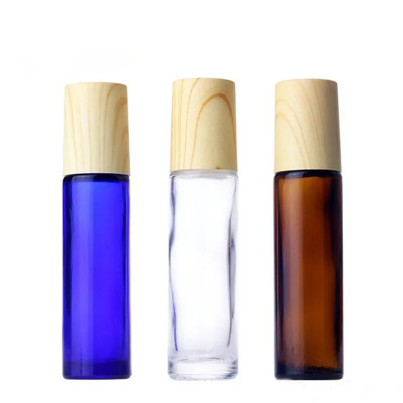 600pcs 10ml azul transparente rolo vazio em garrafas de perfume de vidro Roller de aço inoxidável recarregável com tampa de grão de madeira