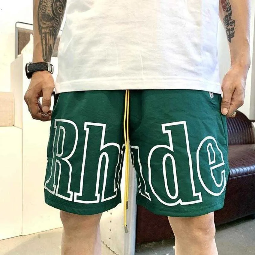 デザイナー 5A RHUDE ショーツメンズバスケットボールショートパンツ 2021 高級夏ビーチヤシの文字メッシュストリートファッション 23ss スウェットパンツ