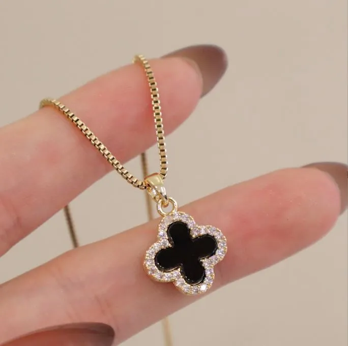 Black 4 store leaf clover necklace