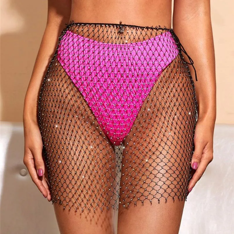 Saias brilhantes Sexy shinestone fishnet mini -saia praia veja através de diamante malha para mulheres boate de festas de festas de festas