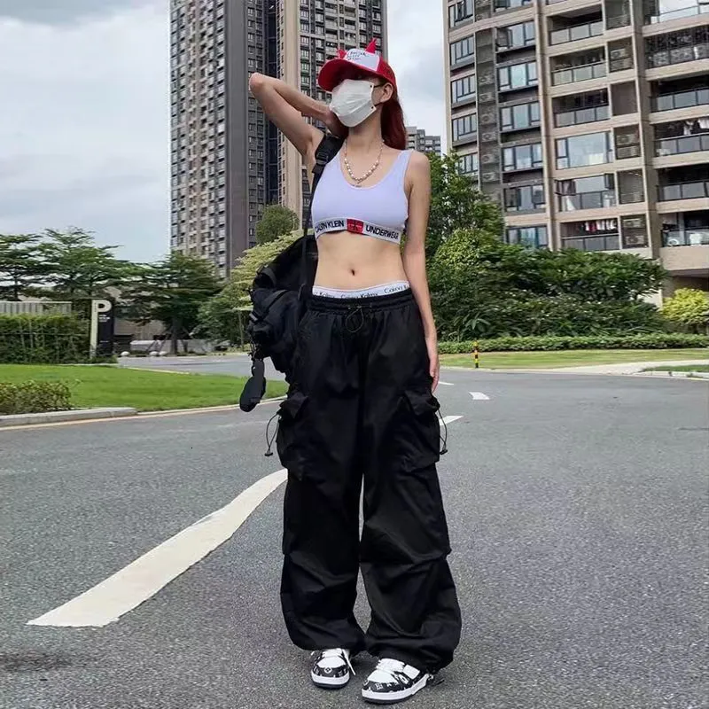 Pantaloni larghi neri ragazza top