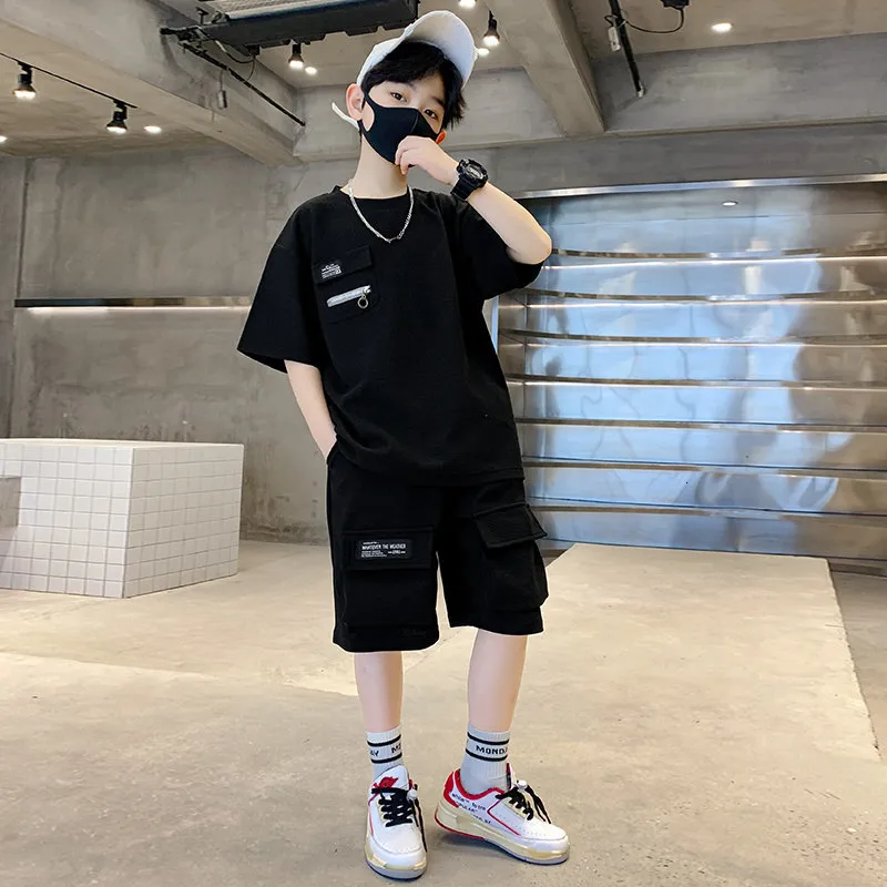 Set Di Abbigliamento Set Di Abbigliamento Ragazzi Estate Grigio Grigio A Maniche Corte Tshirtshorts Nuovi Bambini Cool Casual Stile Outfit Sportivi Sciolti 5 14 Anni 230505 Da 17 11 DHgate