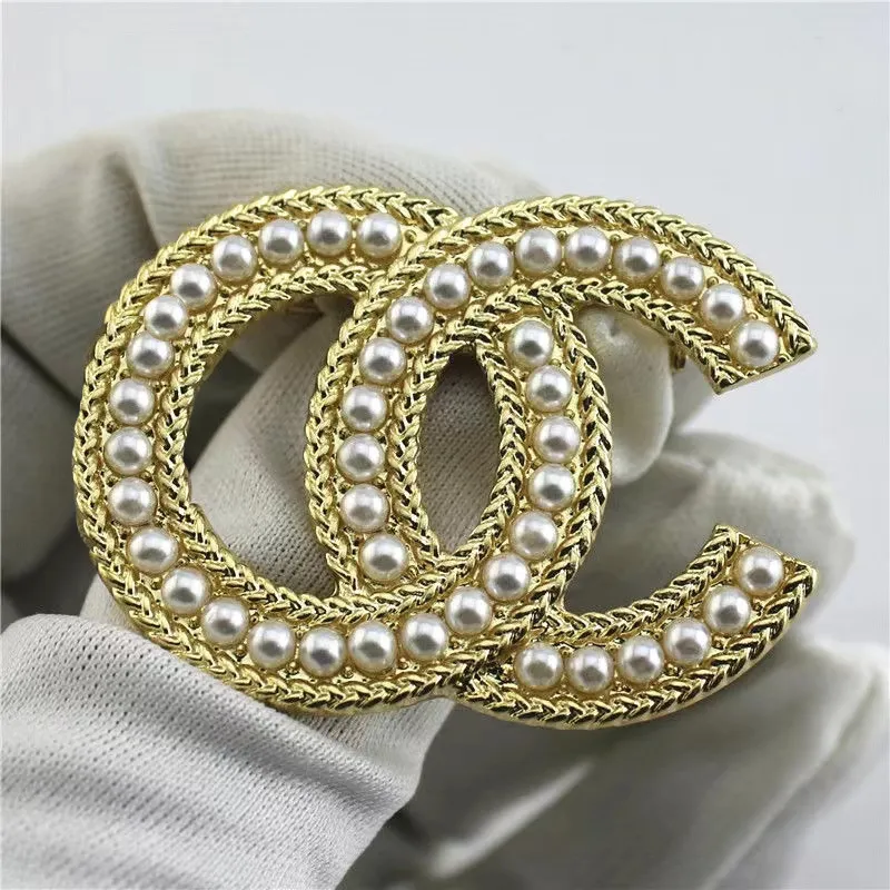 Best brooch designers hot sale