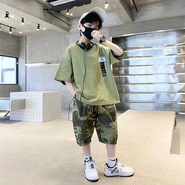Completo estivo 2026 per ragazzi: Tuta casual sottile tinta una per bambini, set nero con t-shirt e pantaloncini con tasche, per età 5-12 anni 1501 Completo estivo 2026 per ragazzi: Tuta casual sottile tinta una per bambini, set nero con t-shirt e pantaloncini con tasche, per età 5-12 anni 1501