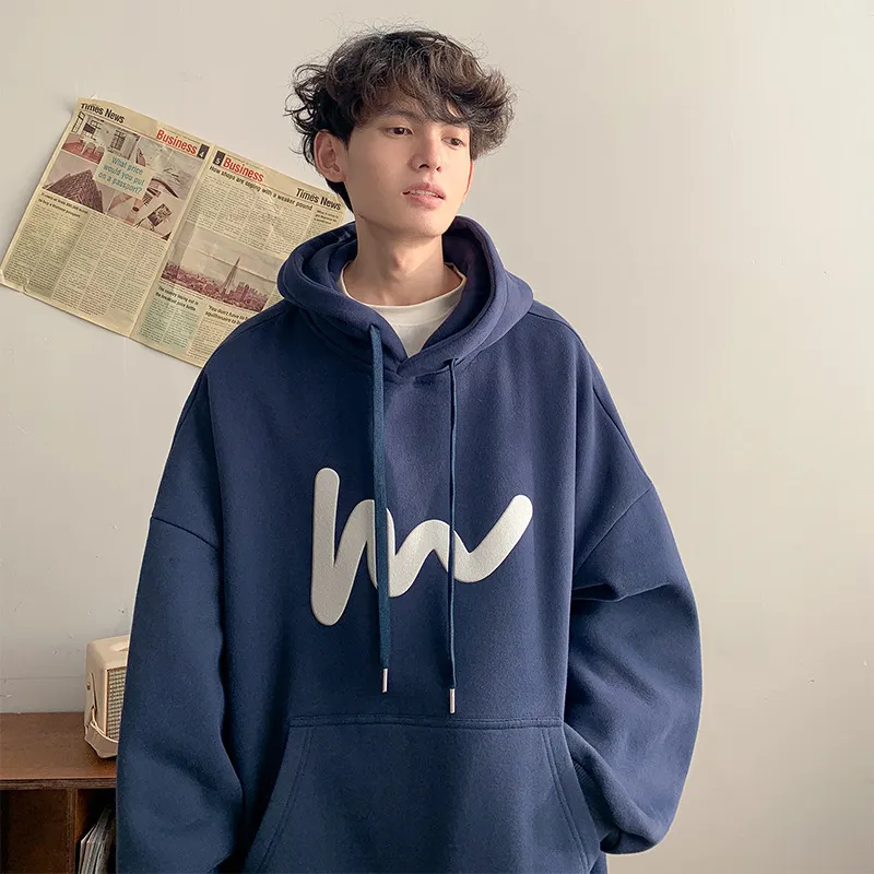 Boy in oversized hoodie store