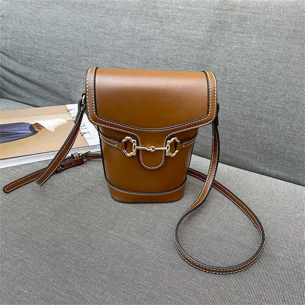 Çantalar erken bahar yeni çok yönlü kova küçük çanta moda çok yönlü cep telefonu çantası taşınabilir hafif bir omuz crossbody