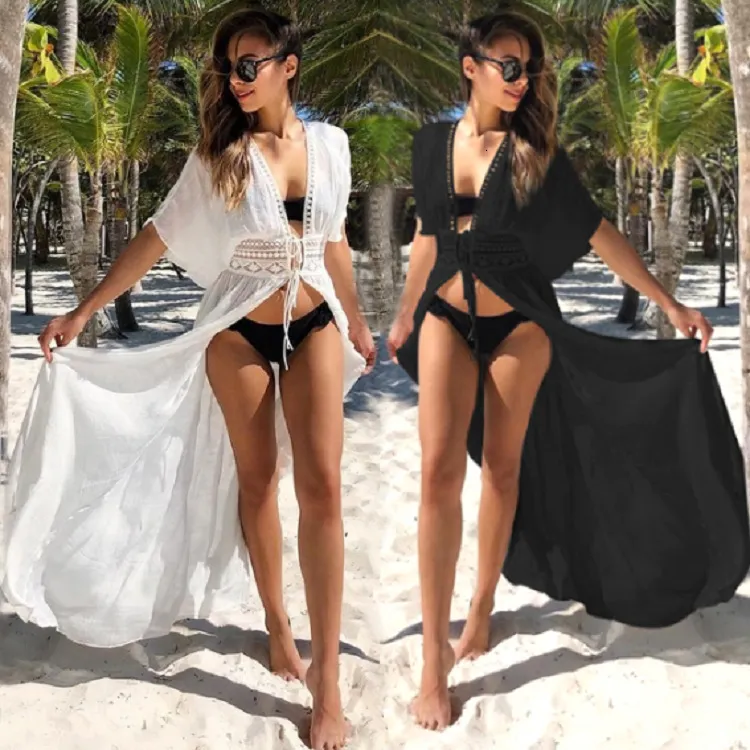 Kvinnors badkläder 2023 Boho White Crochet Sticke Beach Cover Up Dress Tunic Long Pareos Bikinis S Swim Robe Plage Beachwear 230504