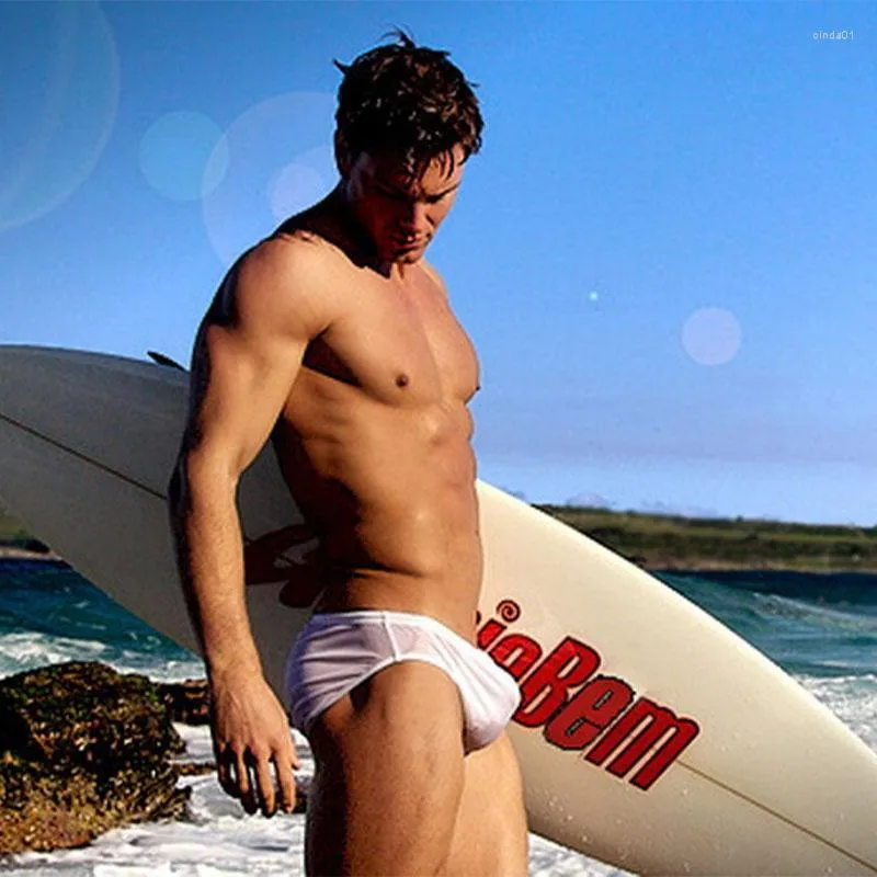 رجل ملابس ملابس الرجال ملابس داخلية أبيض لون صلب شفاف لسطح الشاطئ منخفض الخصر المبيدات للسباحة الرجال مثلي الجنس العضلات الوسيلة