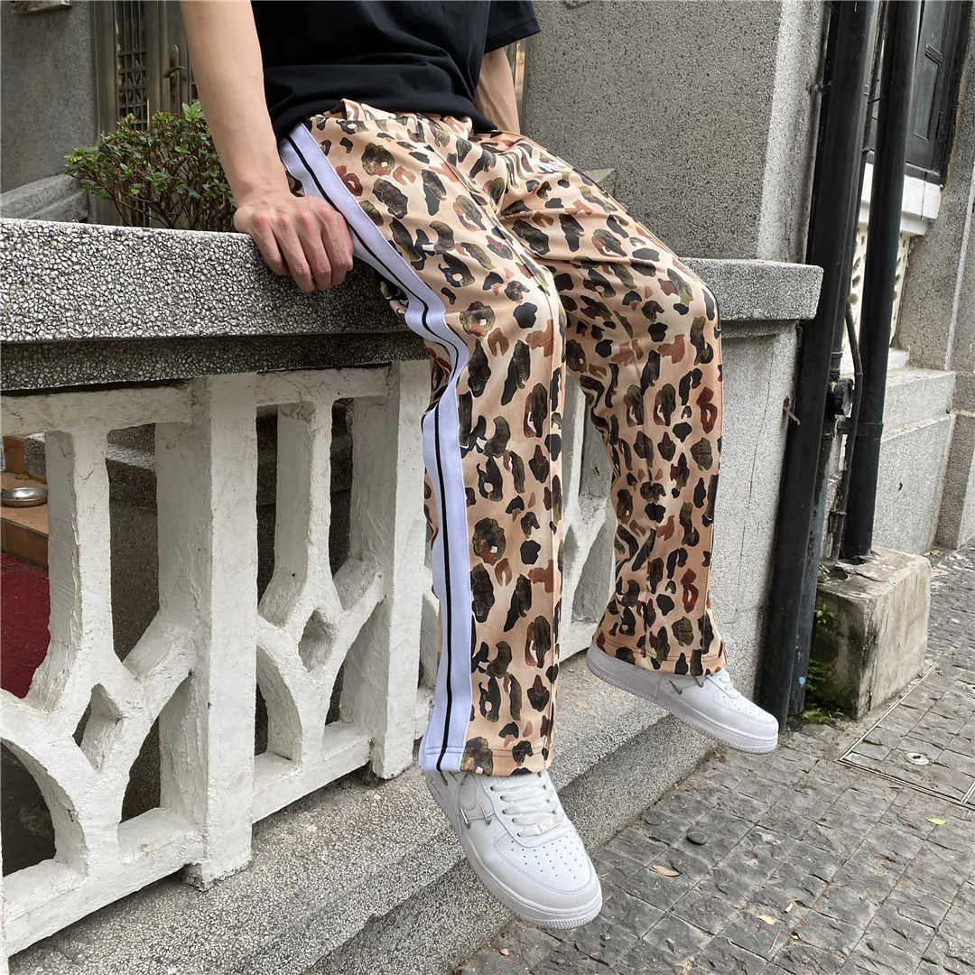 Leopard print side stripe trousers on sale