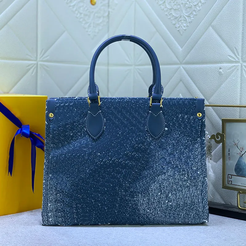 Denim tote çanta kadınlar vintage çantalar mavi siyah omuz çanta dükkan çantaları plaj çantası çantası orta el çantası tuval gerçek deri klasik mektup baskı büyük kapasite