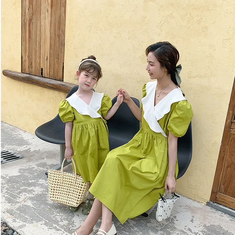 Stylish mom and daughter dress up store