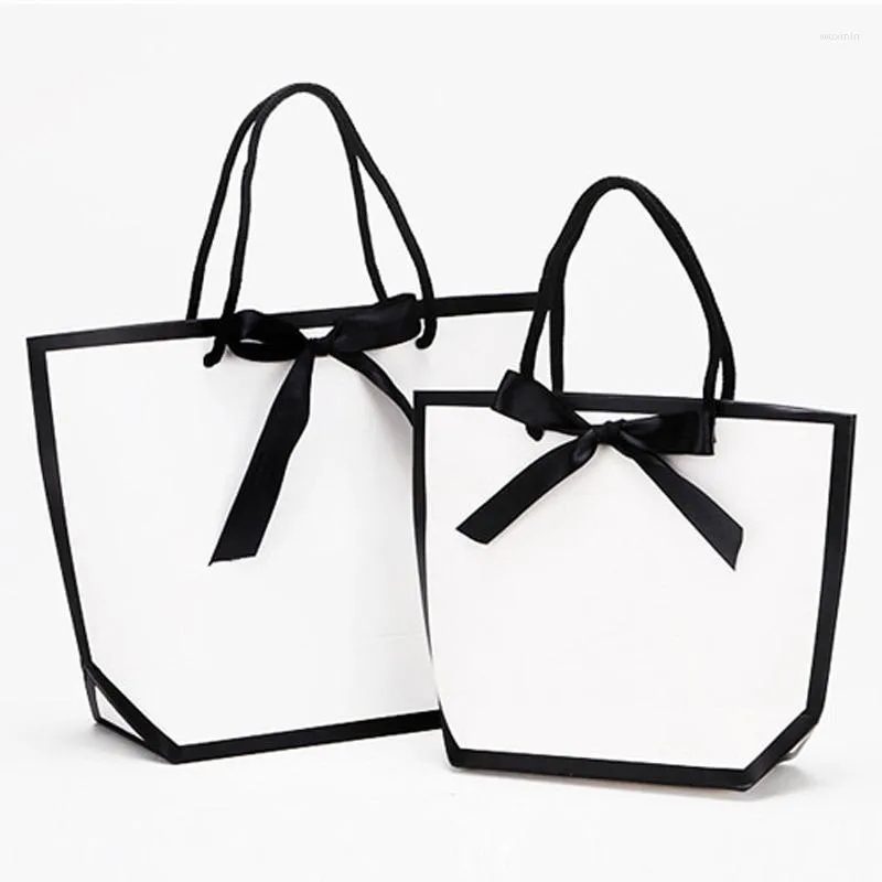 Emballage cadeau 10 pièces Portable petits sacs pour mariage anniversaire baptême fête bonbons Souvenir cadeaux emballage papier sac blanc sac à main