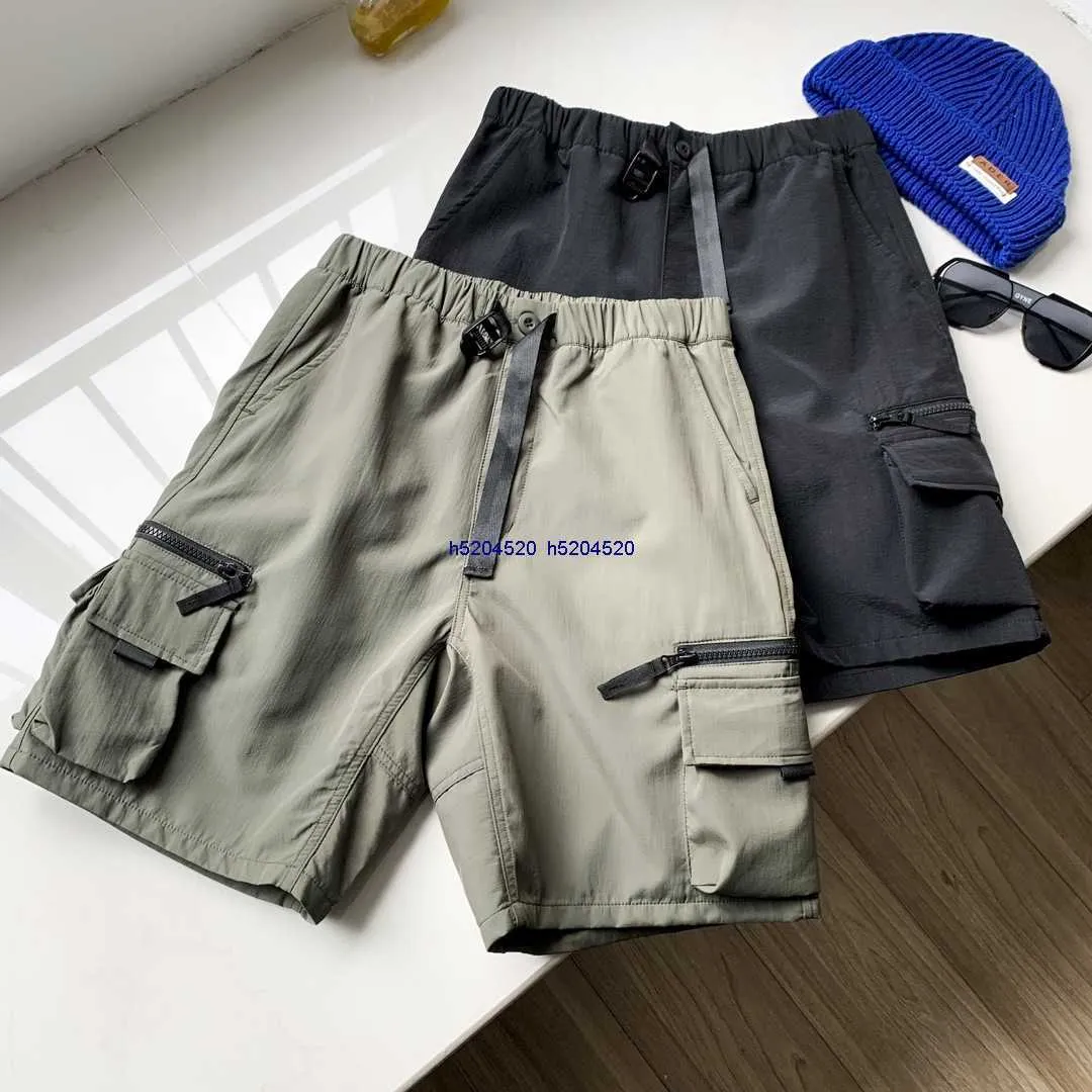 23 Summer New Men's Shorts Fashion Märke Carhart Militärstil Shorts med 3 m reflekterande multifunktionella fickor Funktionella femdelar Pants Paretikett Ins Pyyn