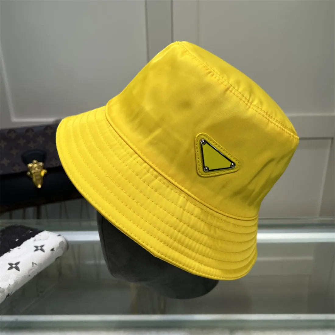 Prada bucket hat yellow hotsell