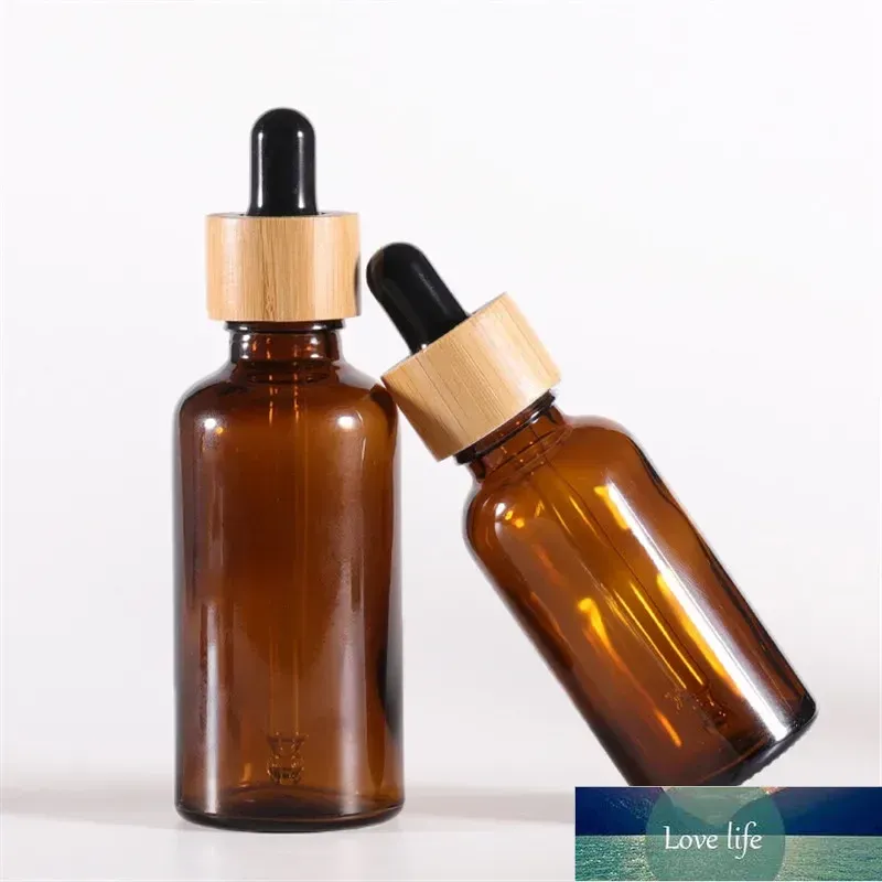 Flacon compte-gouttes en verre ambré en gros avec couvercles en bambou Bouteilles d'huiles essentielles Flacons d'échantillons pour liquides cosmétiques de parfum 15 ml 20 ml 30 ml 50 ml 100 ml