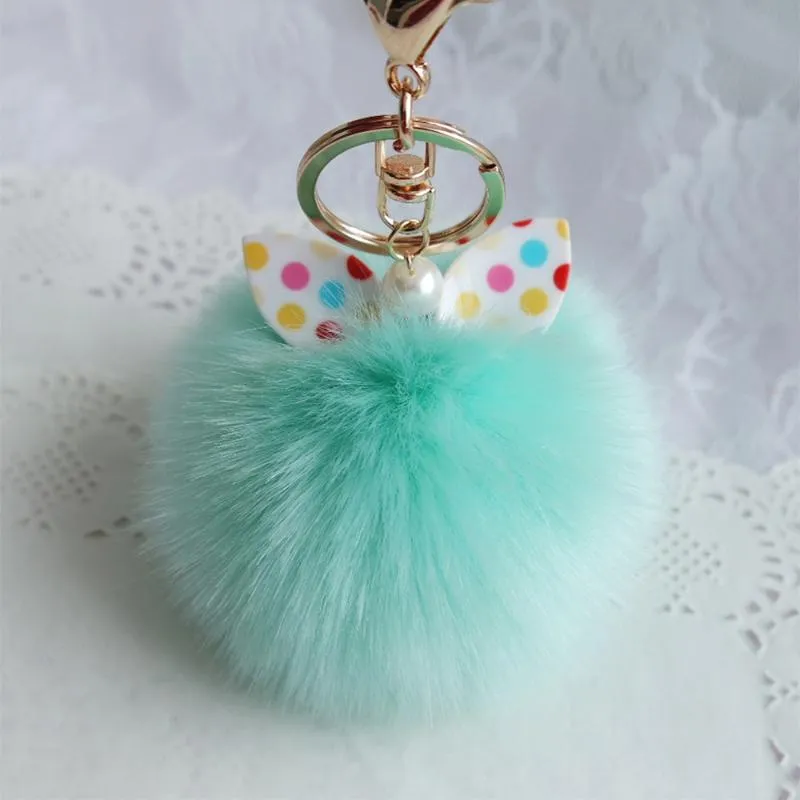 Keychains Mooie donzige oorbont Kok Key Ketting Wave Point Bow-Knot Pompom Artificial Keychain Dames Autobagring