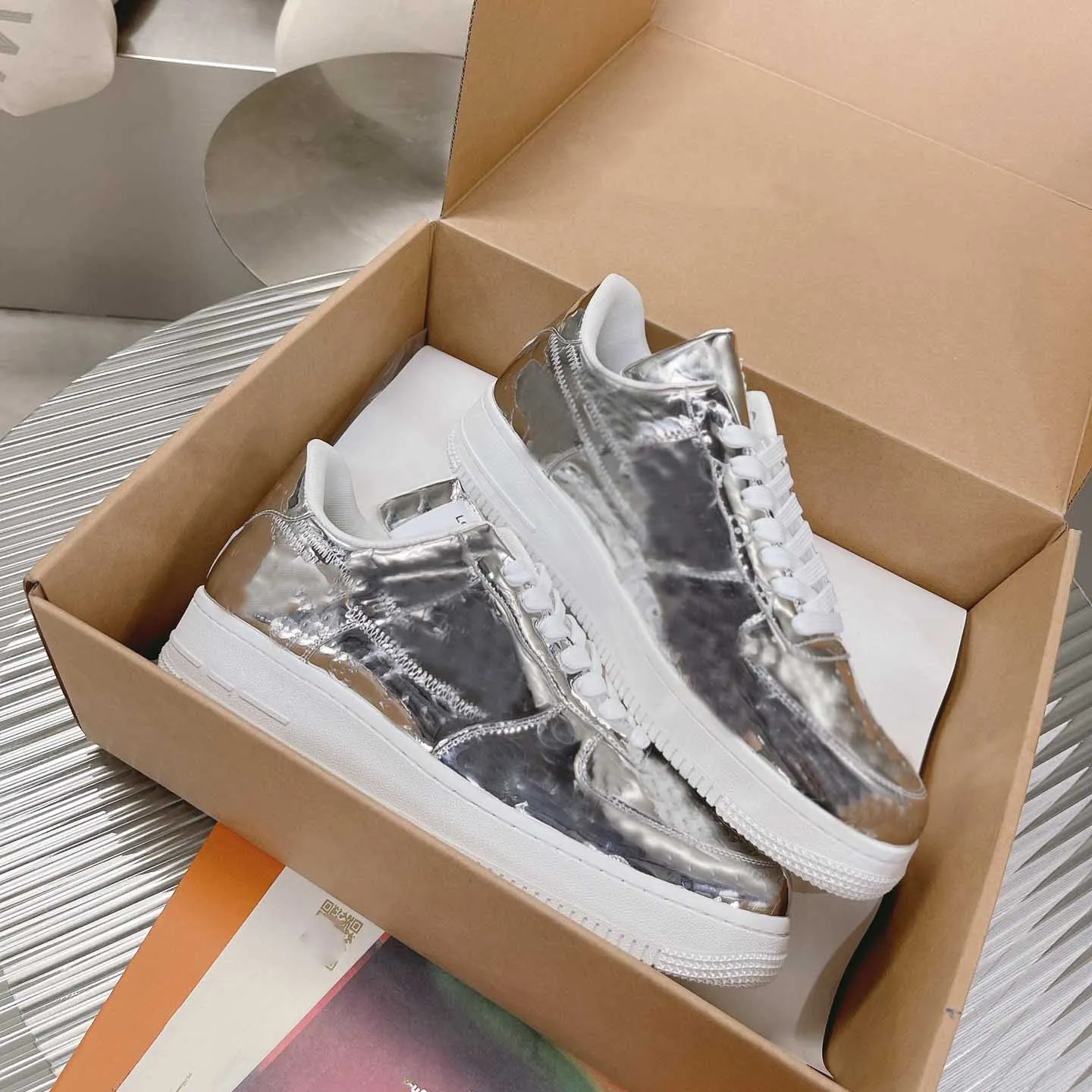 Designer silver sneakers sales