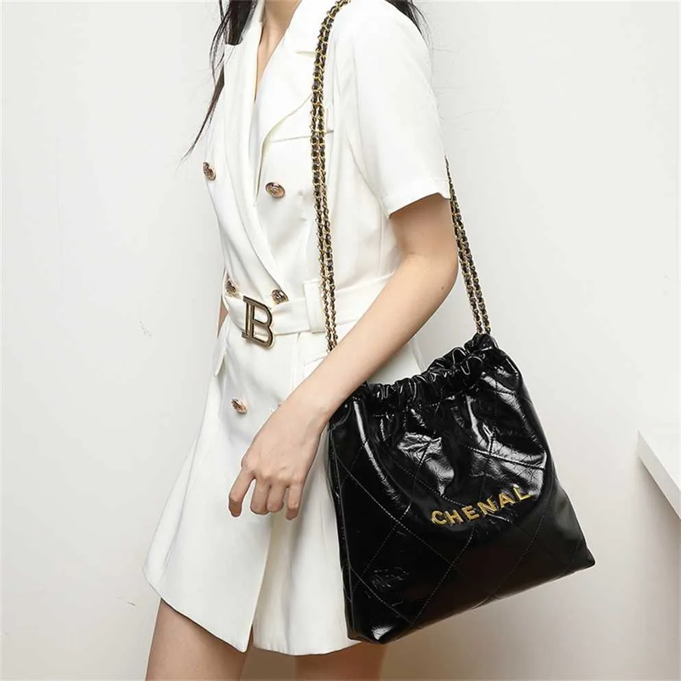 Cheap Purses on sale Xiangnanma Garbage Bag Autumn and Winter New Real Cowhide Chain Personalized Letter Water Bucket Light Luxury Women's