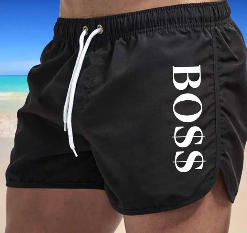 Fast färg sommar snabbtorkande shorts tryckta shorts bad strand shorts avslappnad fitness shorts mäns badkläder sexiga badstammar