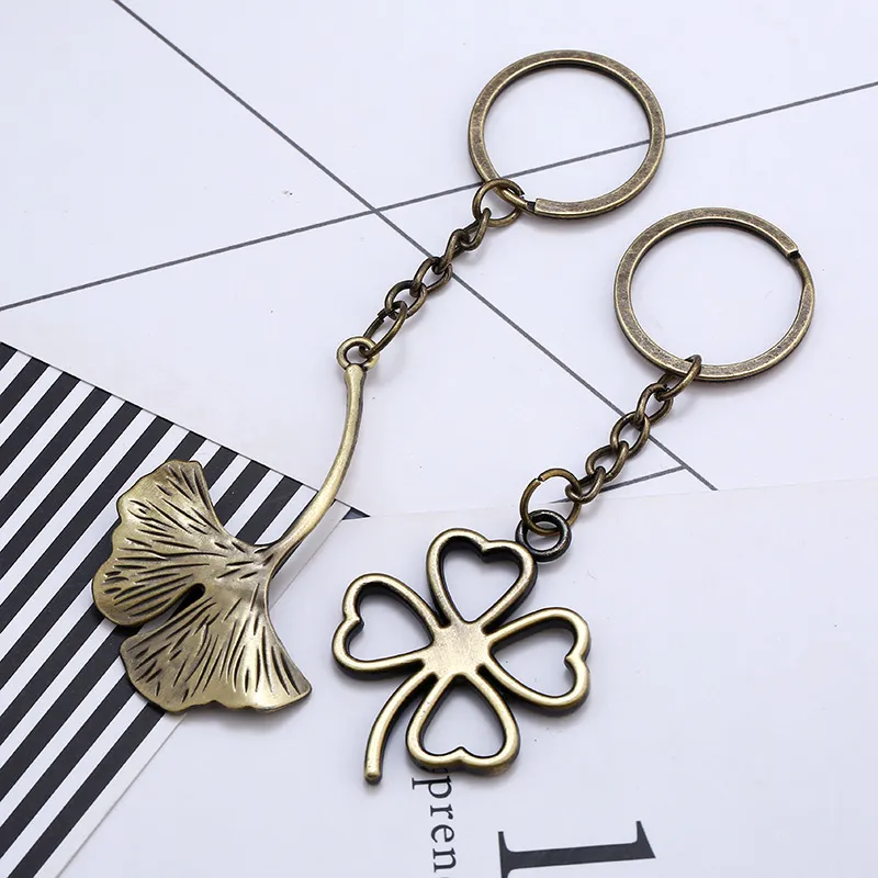 Original Lucky Four Leaves Clover Key Chains New Fashion Bag Buckle Pendant Leaf Keychain for Car Keyrings Keychains Women Jewelry Men Gift