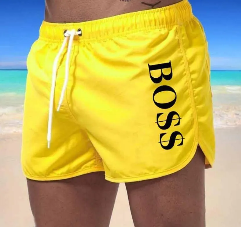 Fast färg sommar snabbtorkande shorts tryckta shorts bad strand shorts avslappnad fitness shorts mäns badkläder sexiga badstammar