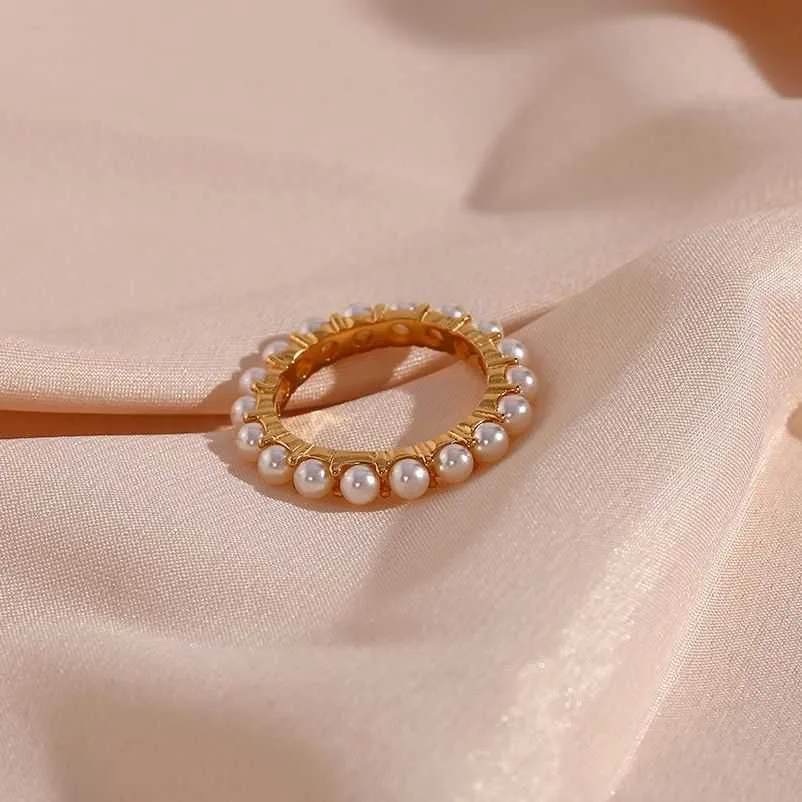 Кольца группы 2023 Новые элегантные жемчужные круглые кольца для женской моды из нержавеющей стали 18 тыс. Золота