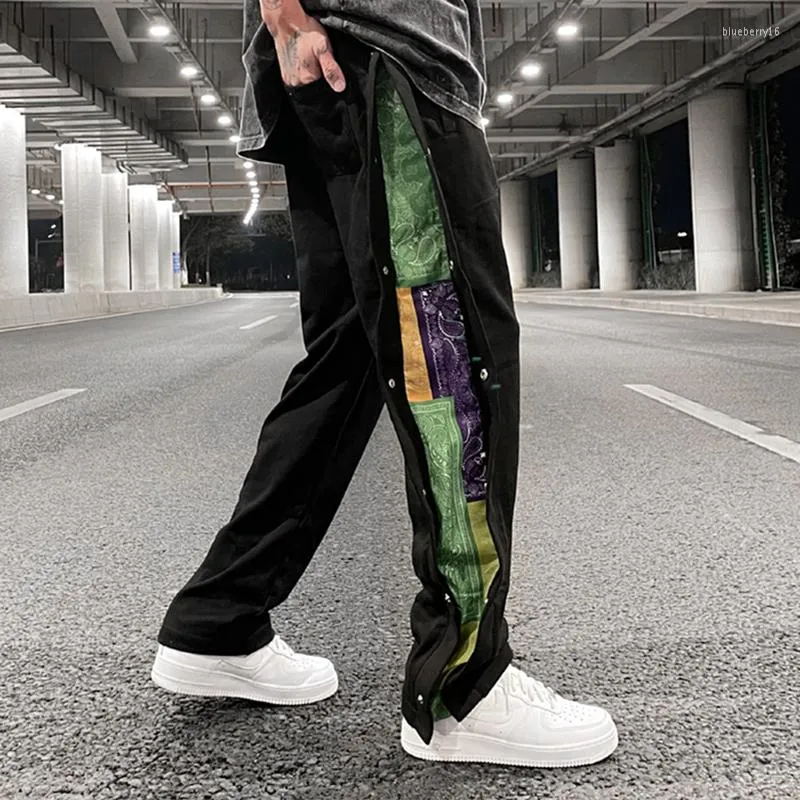 Pantalon chandal con botones laterales hombre sale