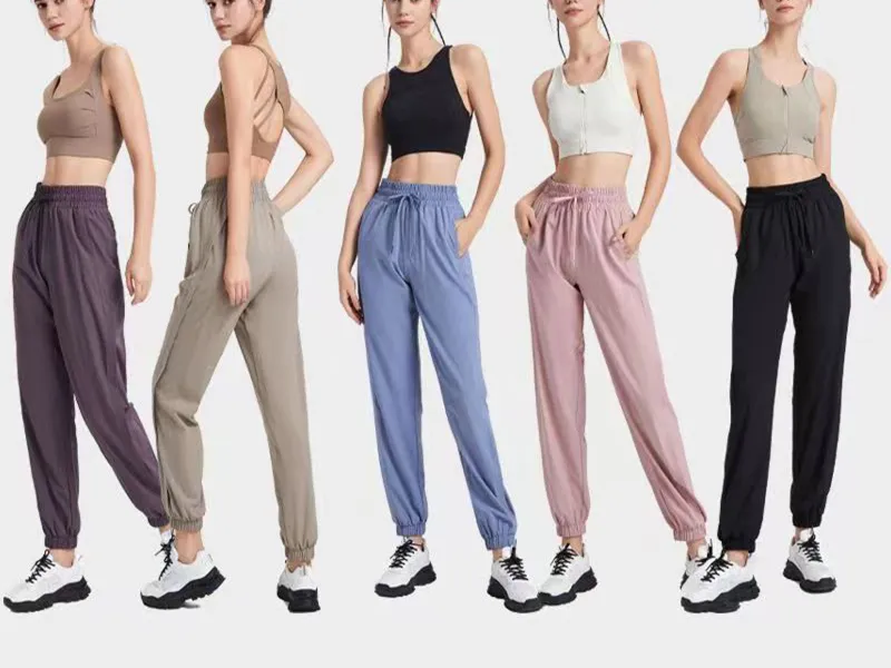 Yoga pant kvinnor aktiva byxor modesportstrån snörning snörning löst passande sportbyxor utomhus löpande träning mångsidig avslappnad sommar coola smidiga leggings