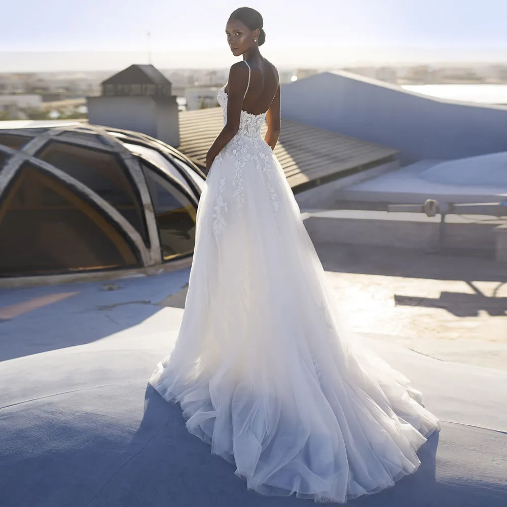 Summer Beach Wedding Dress: Thigh High A-Line with Spaghetti Straps, Beaded Lace Appliques, and Spacious Slits