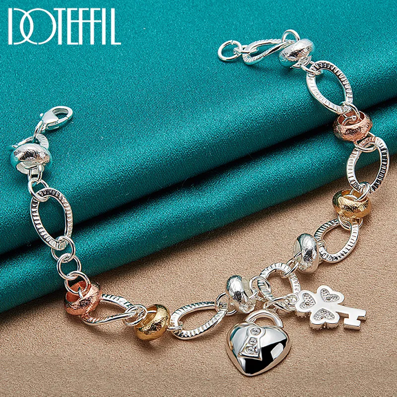 Chain Doteffil 925 Sterling Silver Heart Lock Clover Flower AAA Zircon Armband For Women Wedding Engagement Charm smycken 230508