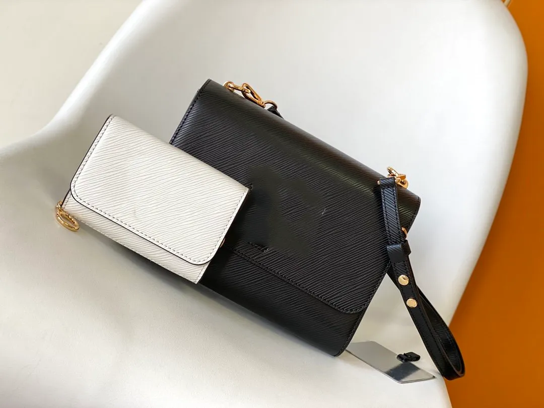 2023 Ny mode casual kvinnors väska klaffspänne check barnmor väska axel crossbody väska