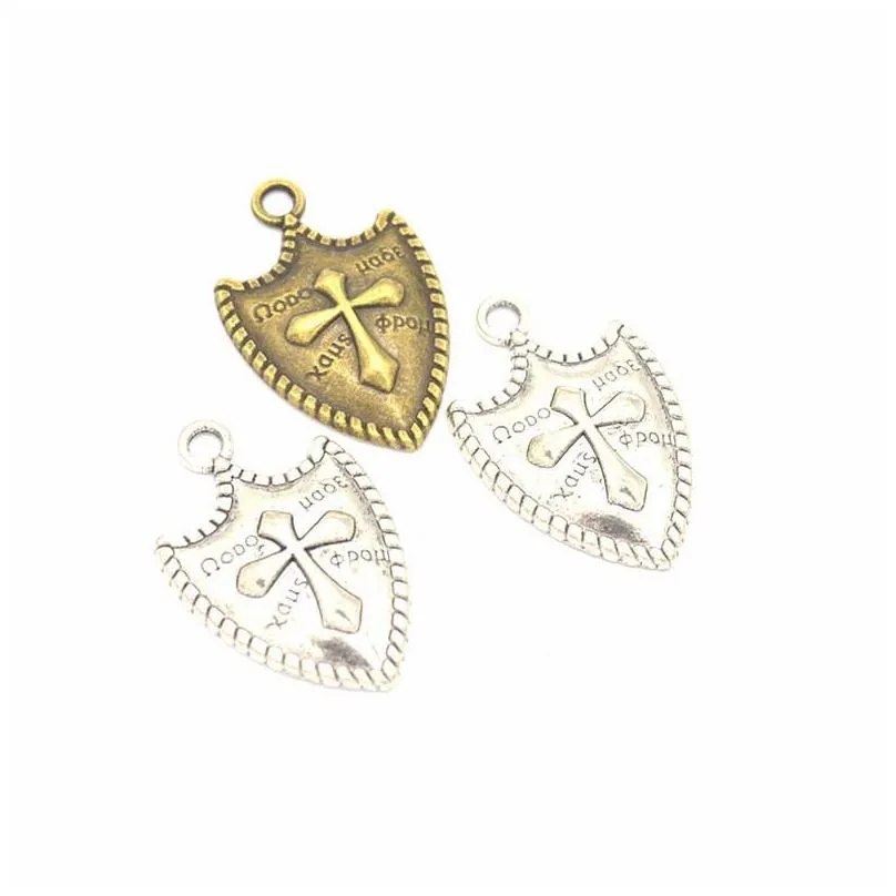 Charms 120st/Lot Cross Shield Pendant Bra för DIY Craft Jewelry Making 31x20mm Antika Sier Bronze Colors Drop Leverans Findings C Dhtna